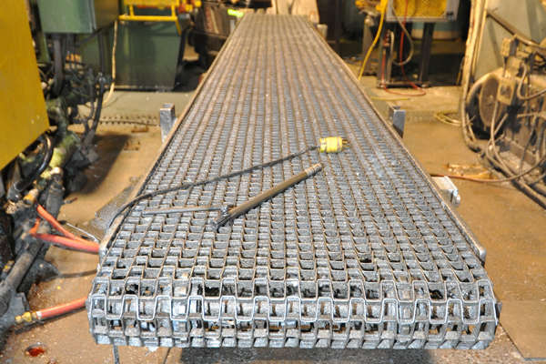 Used Rimrock Model: RR-24-220 24 Inch Wide Mesh Belt Type Indexing Conveyor for Die Cast and Foundry Applications