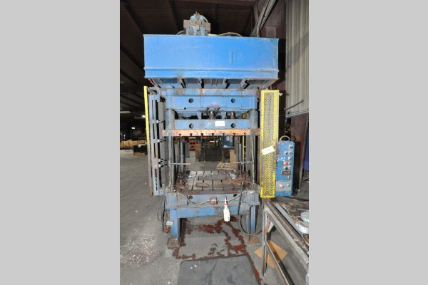 Used E.A. Doyle Model: DVP-30-2845-20 30 U.S. Ton Four Column (Post) Vertical Hydraulic Die Casting Trim Press