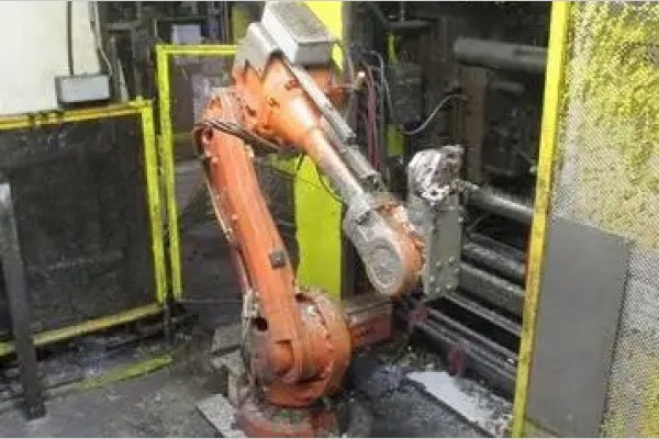 Used ABB Model: IRB 4600F/45 2.05 IRB 4600F/45 Kilogram Six Axis Foundry Rated Industrial Robot with Extractor Package/Gripper for Extracting Die Castings