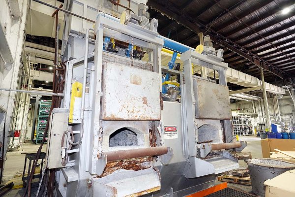 Used Striko Westofen Model: MH II-B 4000/1500 G-eg 1500 kg/hour (3,300 lb/hour) Stack (tower/shaft) Type Stationary Aluminum Melting and Holding Furnace